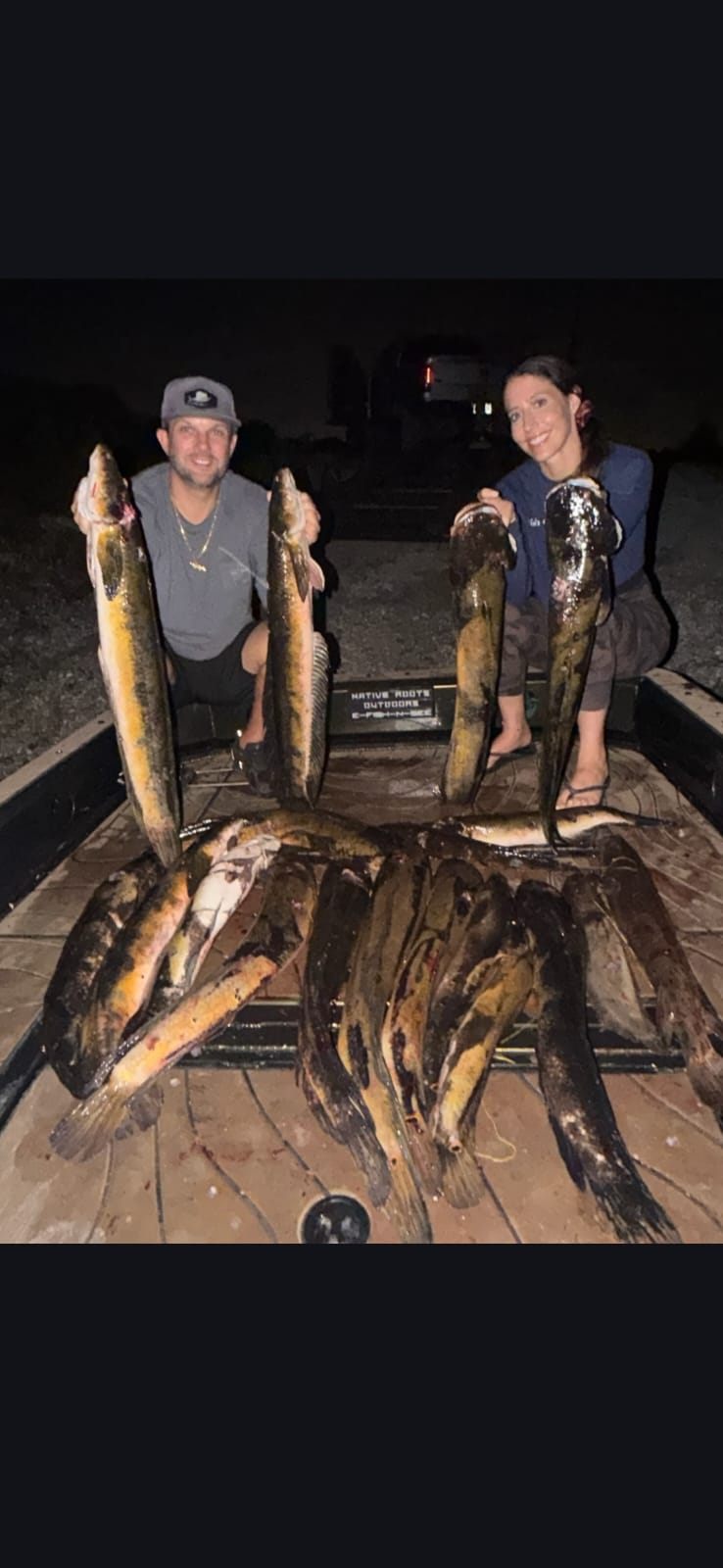 Native Roots Outdoor bowfishing trip photo with guests, fish, boat lights, and South Florida water