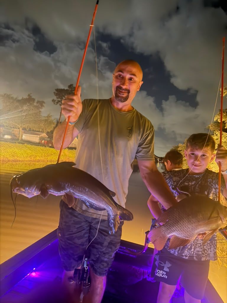 Native Roots Outdoor bowfishing trip photo with guests, fish, boat lights, and South Florida water